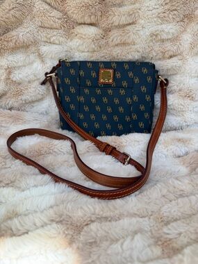 Dooney & Bourke Navy DB Logo Crossbody with Brown Leather Strap